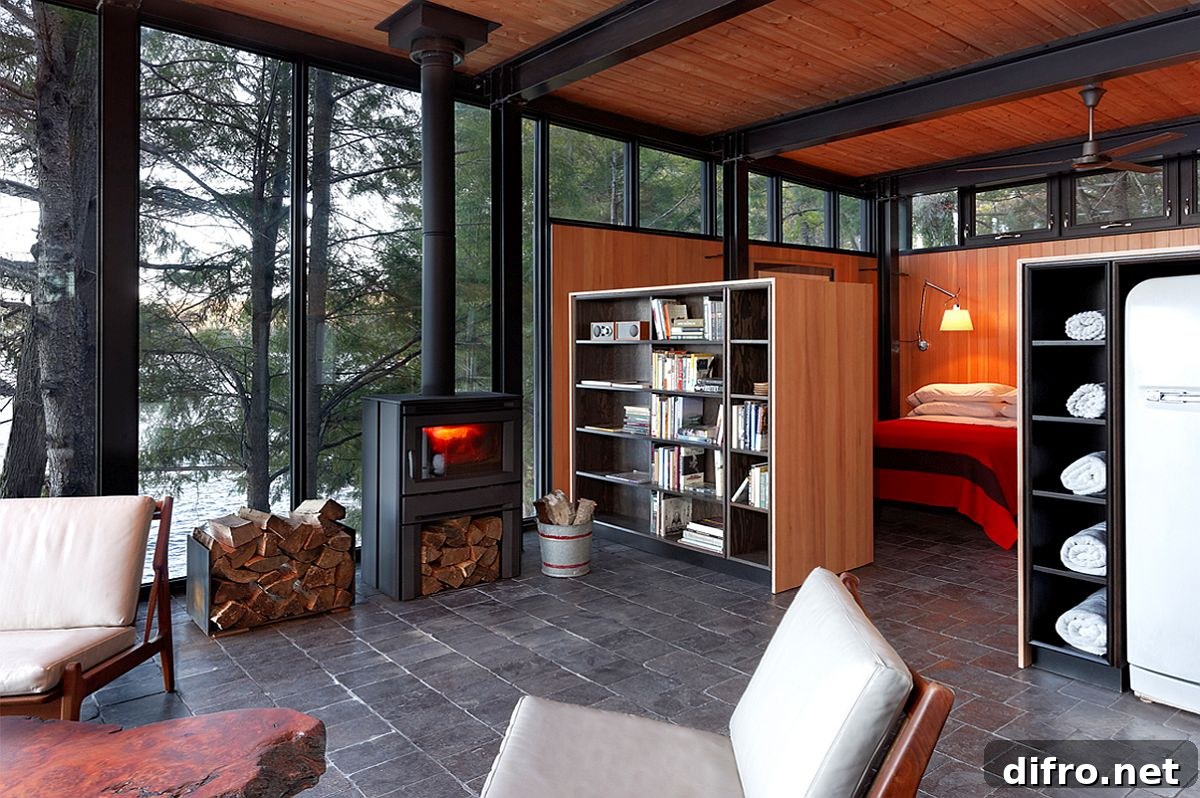 Living space and bedroom of the small lakehouse with space for water activities