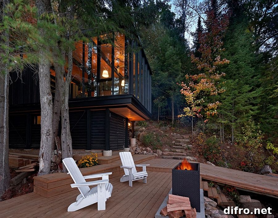Outdoor fireplace, deck and access ramp to the boathouse on Kawagama Lake