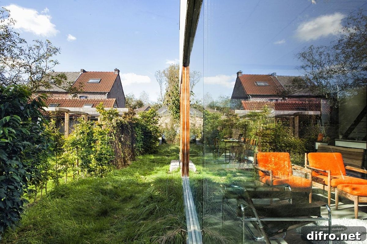 Interior view showing glass walls that connect to the landscape