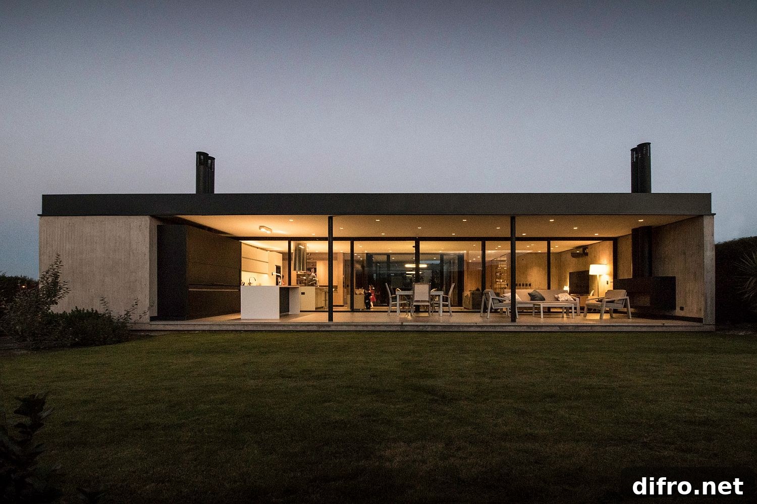 Rear facade of the home opens up towards the outdoors