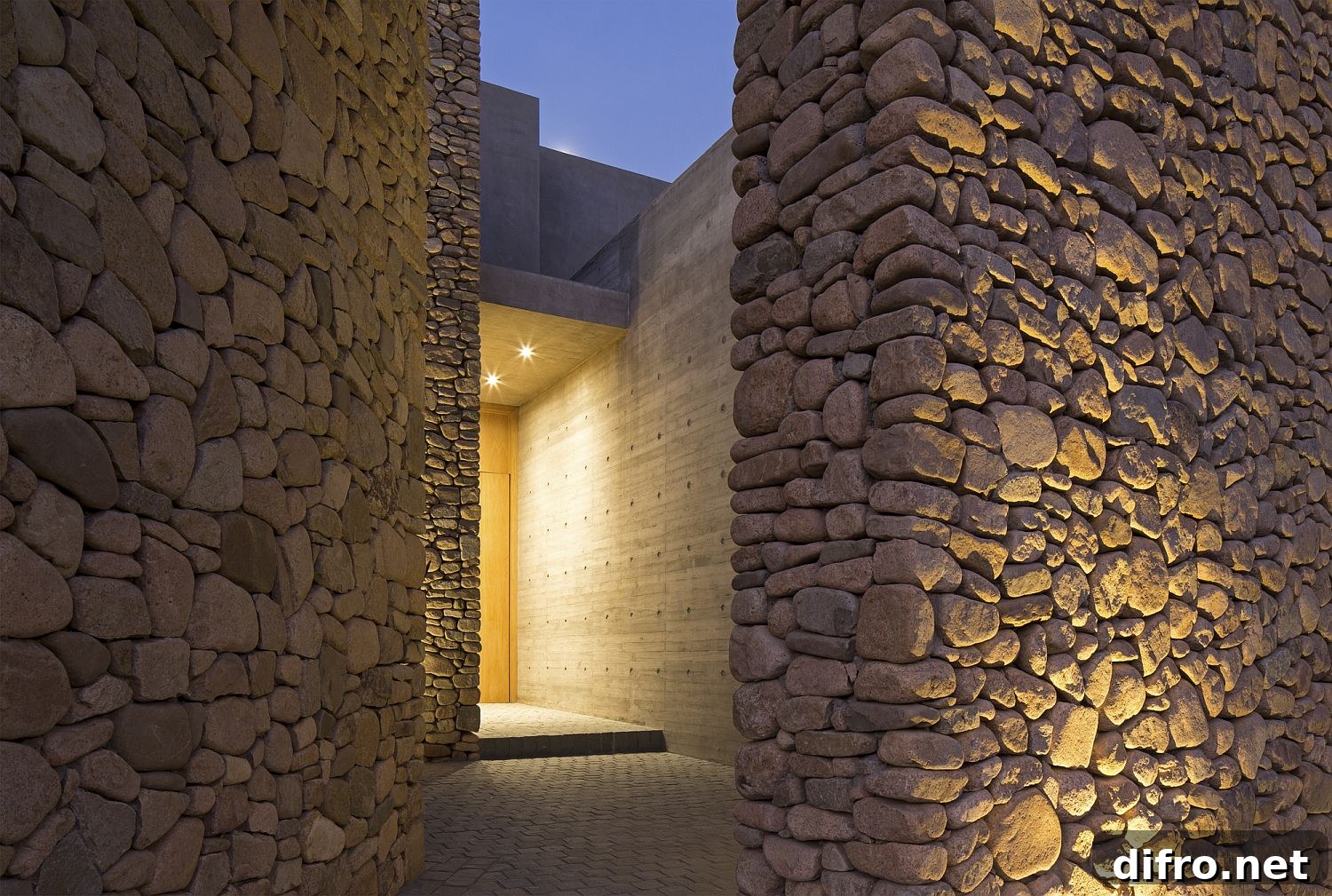 Sheltered stone entry of Cerro la Cruz House