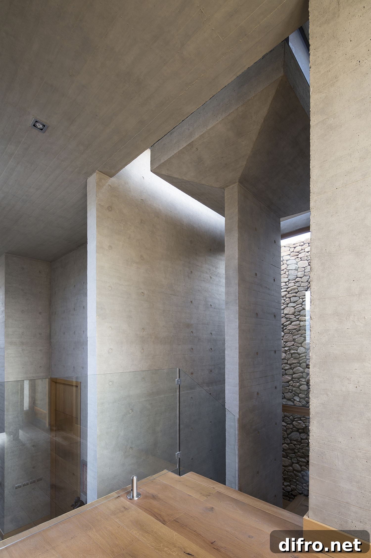 Concrete interior and minimalist finishes at Cerro la Cruz House
