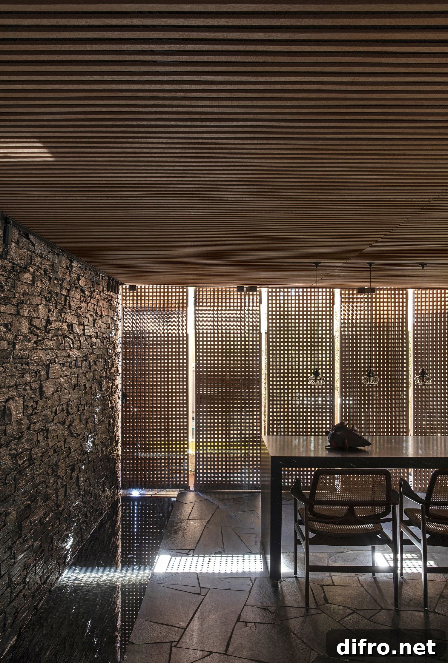 Dining room featuring stone, polished marble and wood