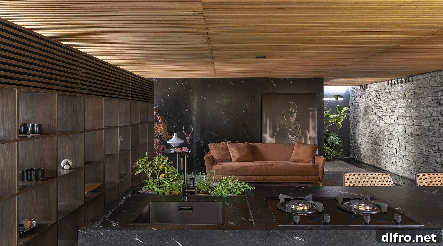 Living room with polished stone finishes and a water feature at the entrance