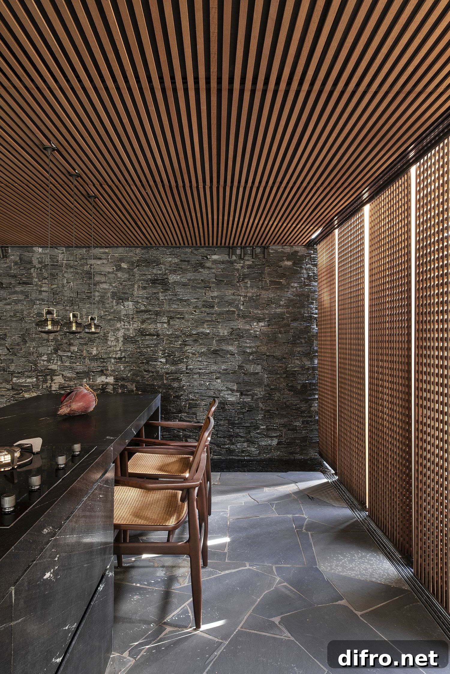 Dark kitchen with a wooden ceiling