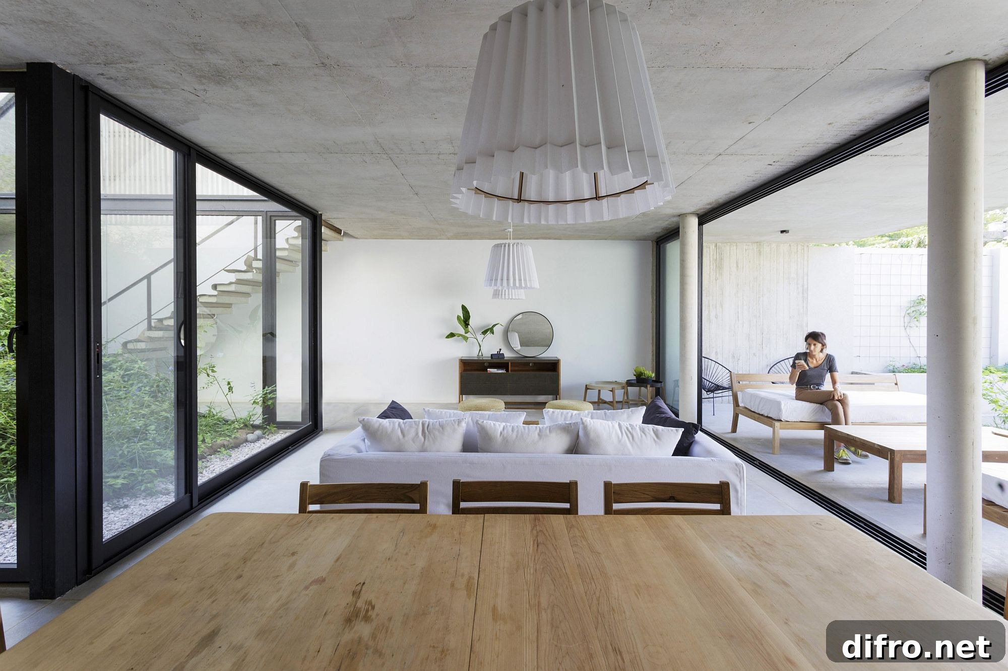 Concrete ceiling adds textural beauty to the living room