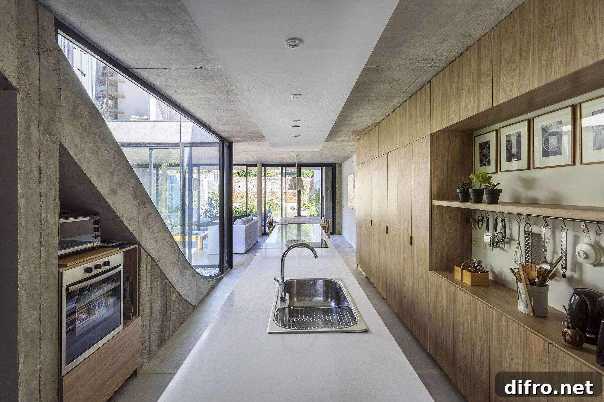 Wood and concrete kitchen and dining area