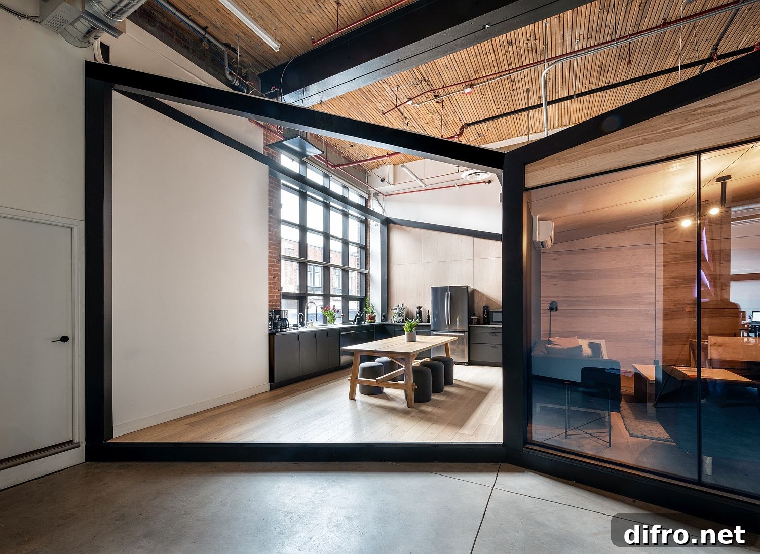 ARTJAIL Office interior with industrial elements and modern finishes
