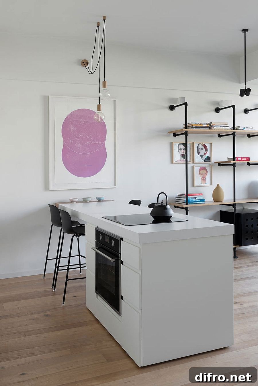 Casual use of Edison bulbs above the kitchen counter lights up this space