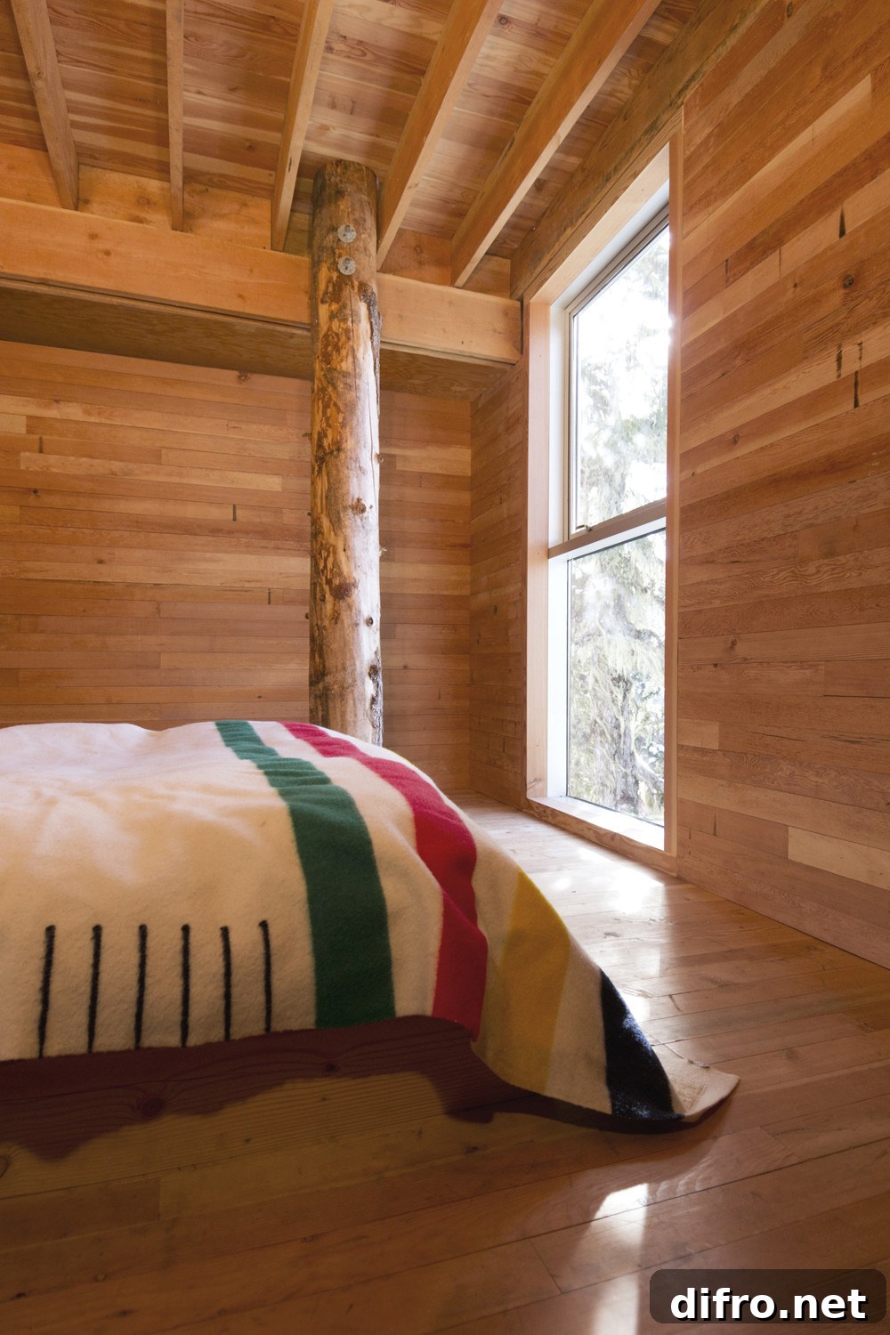 Bedroom with a view of snowy slopes