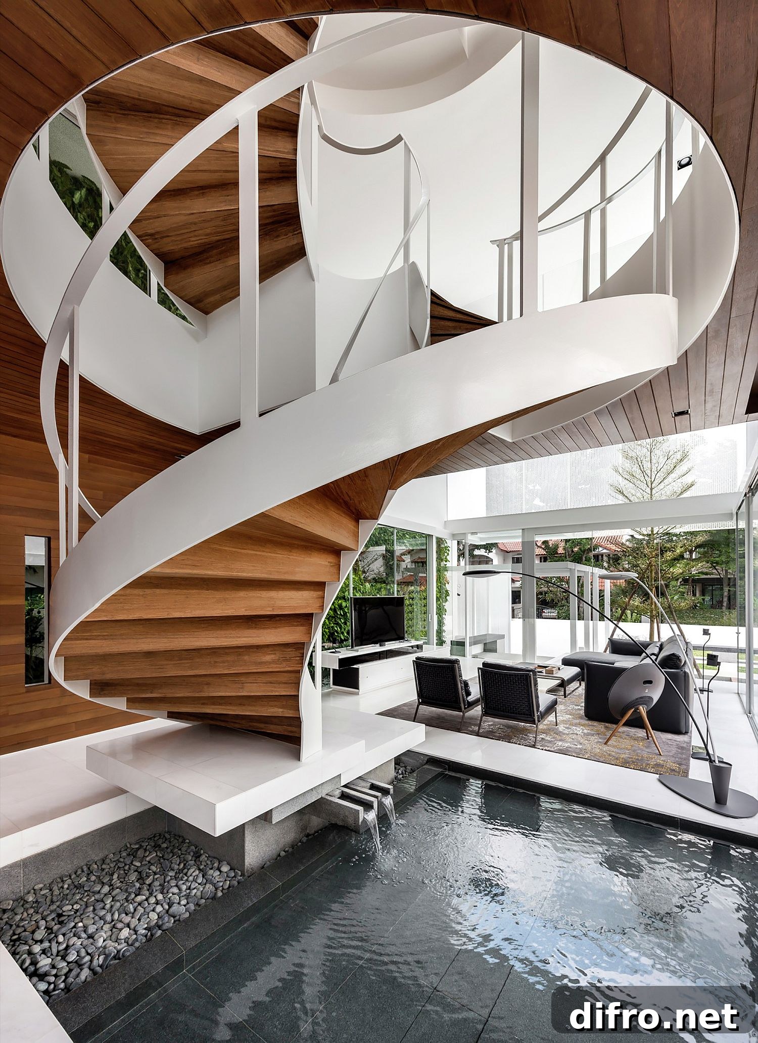 Stunning central spiral staircase and pool of the house