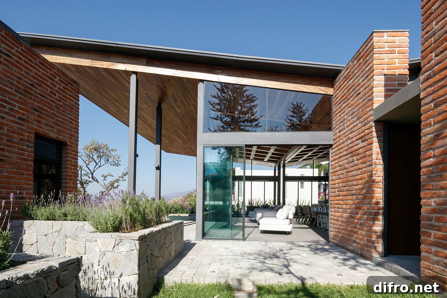 Locally sourced materials coupled with brick to create a cool urban home