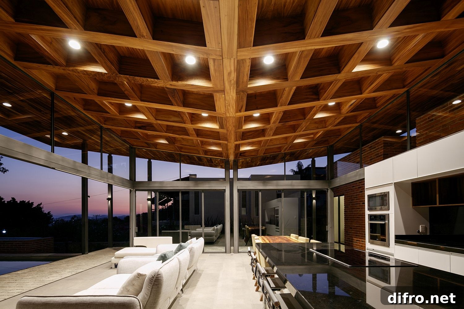 Stylish open plan living area of the holiday home next to a lake