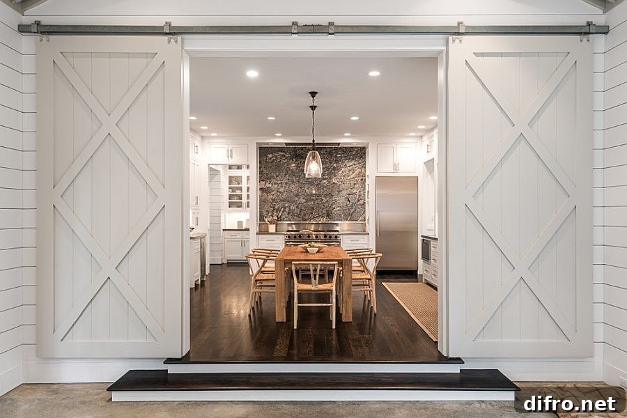 Barn style sliding doors for kitchen-dining area