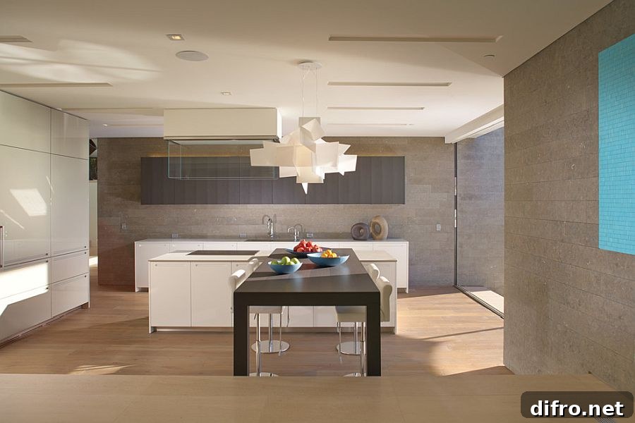 Contemporary minimal kitchen with dark dining table
