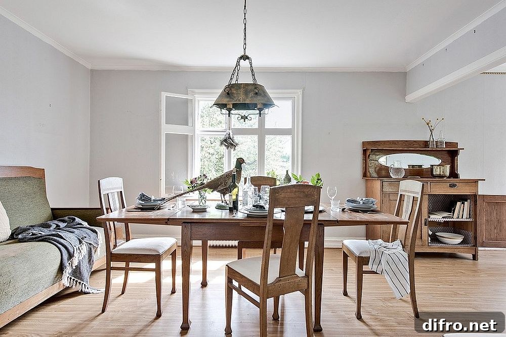 Large window bringing natural light into dining room