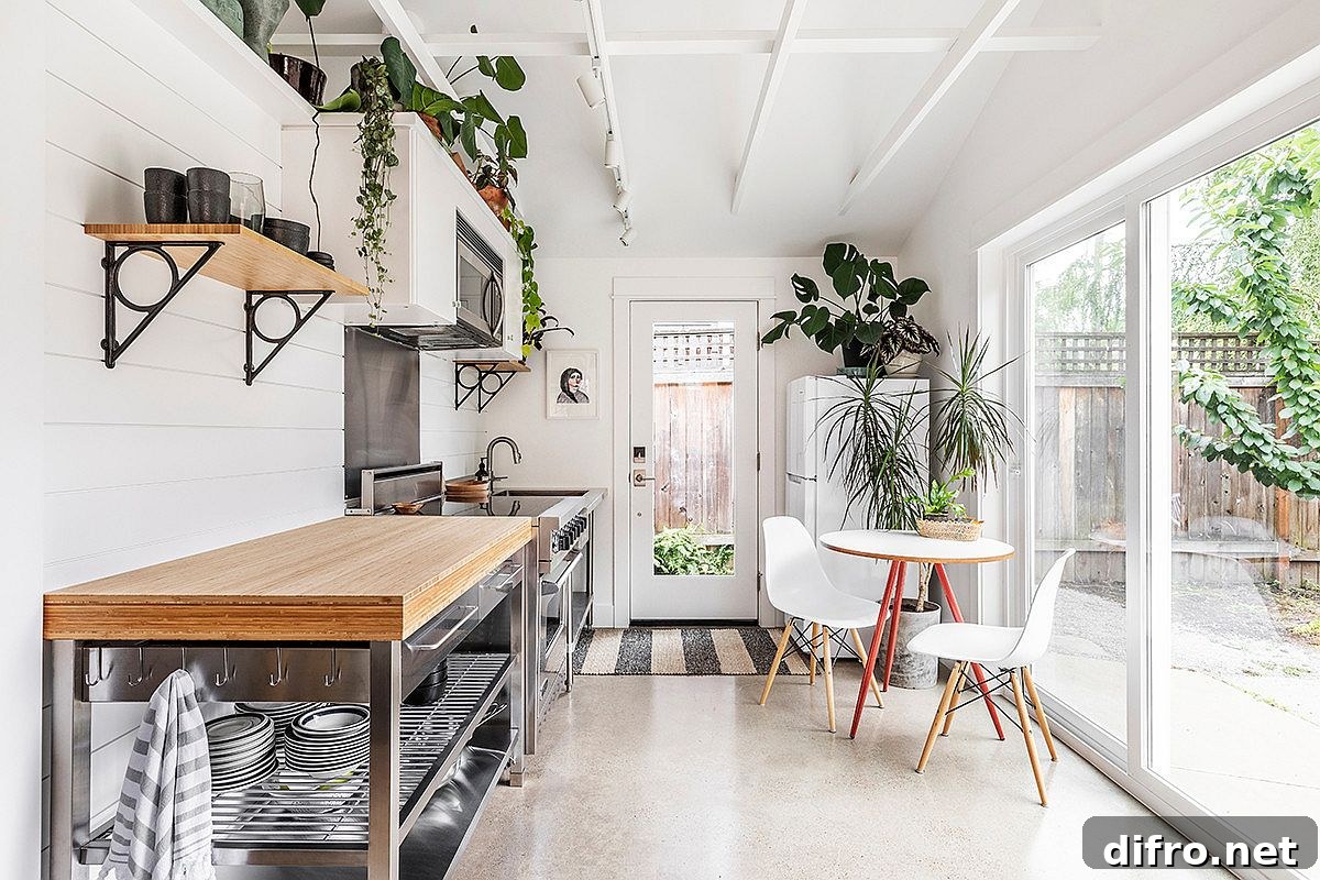 Kitchen with sliding glass doors connecting to outdoors in a breezy beach style