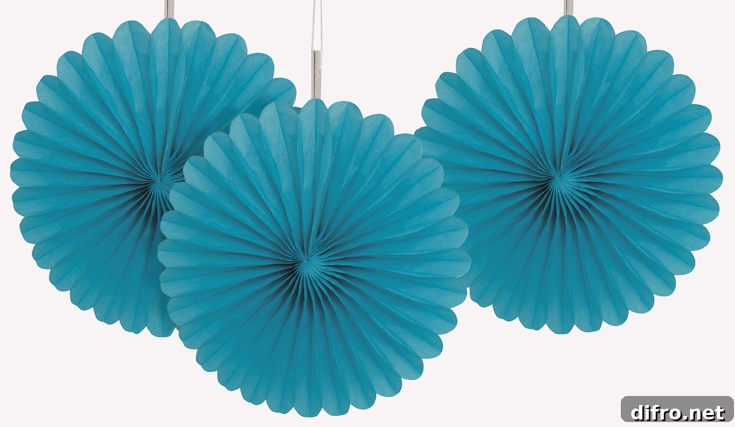 Teal paper fans used as decorations
