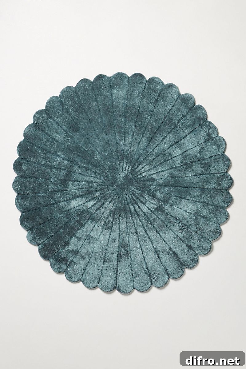 Scalloped teal rug design