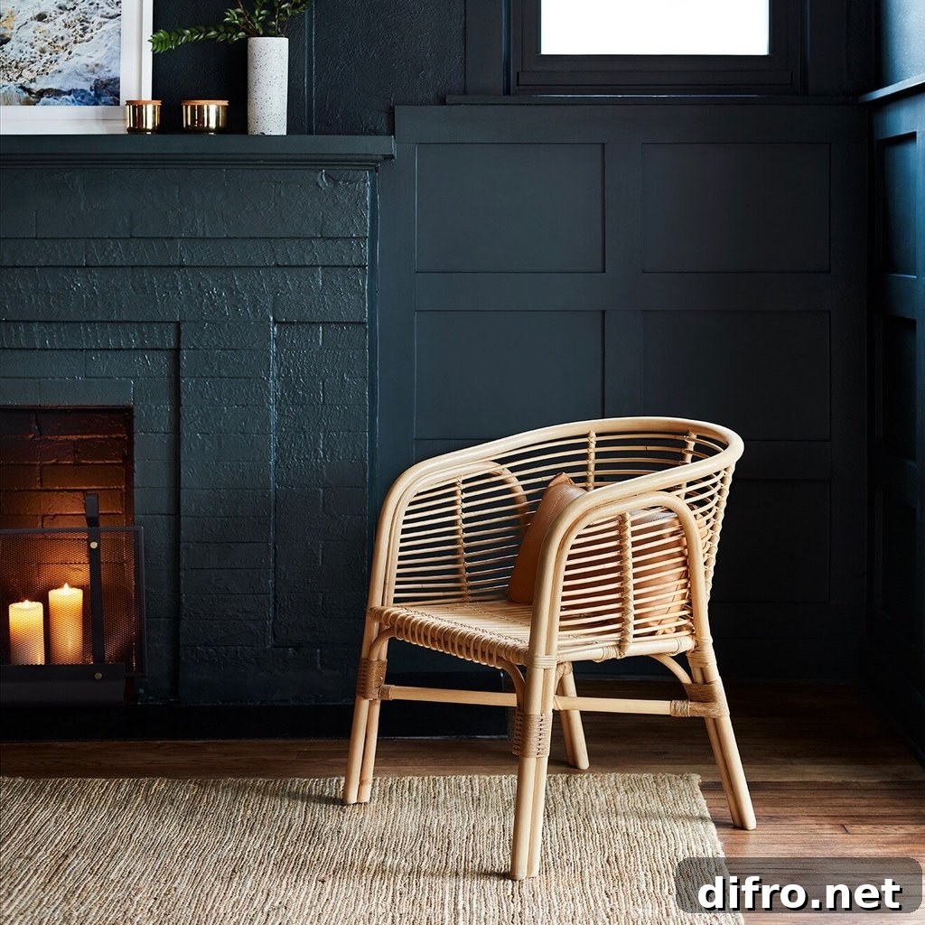 Handcrafted rattan lounge chair with woven detailing and curved frame