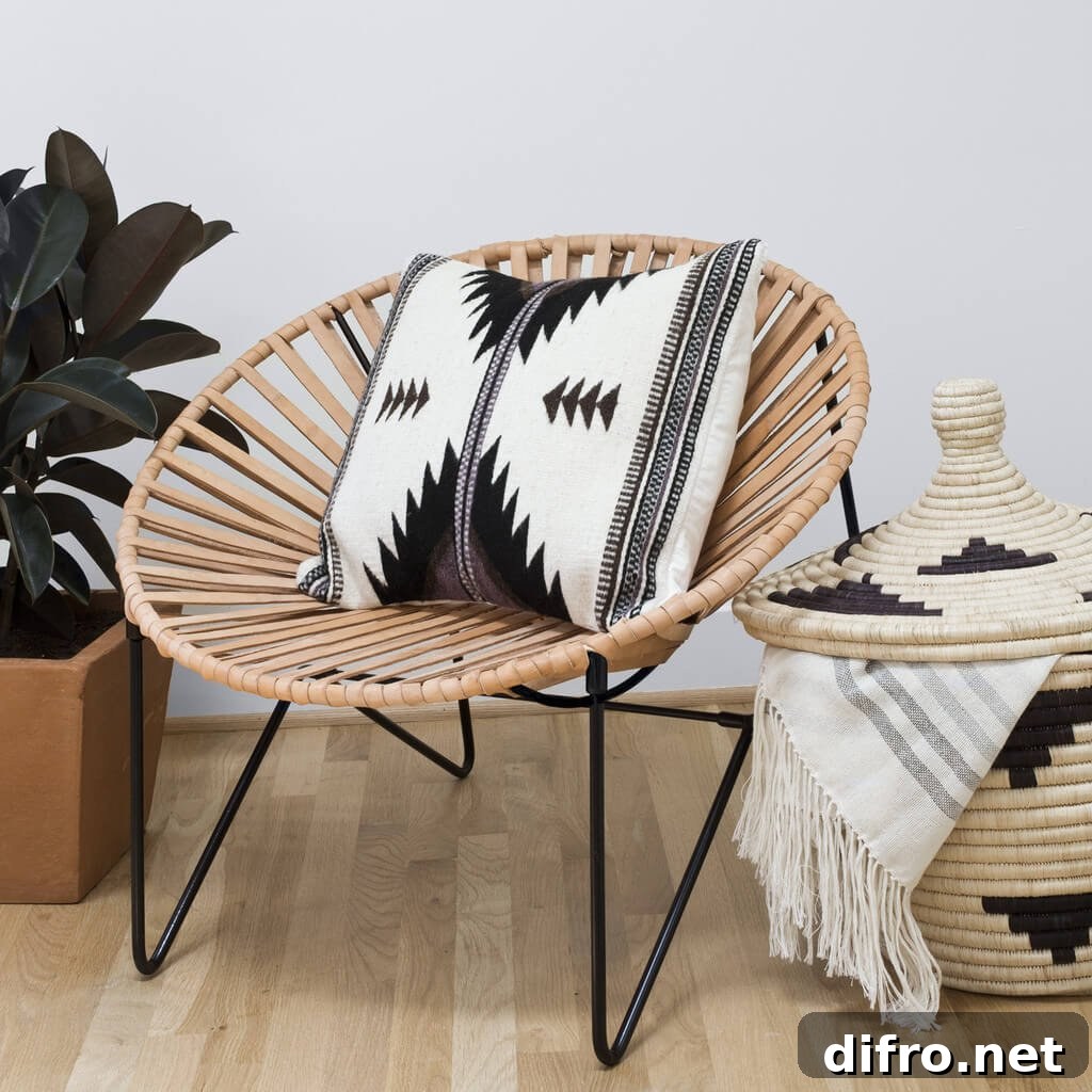 Leather Acapulco-style chair with woven seat and open circular frame
