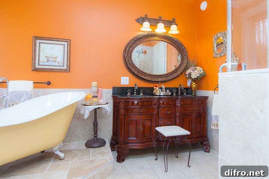Orange accent wall in bathroom