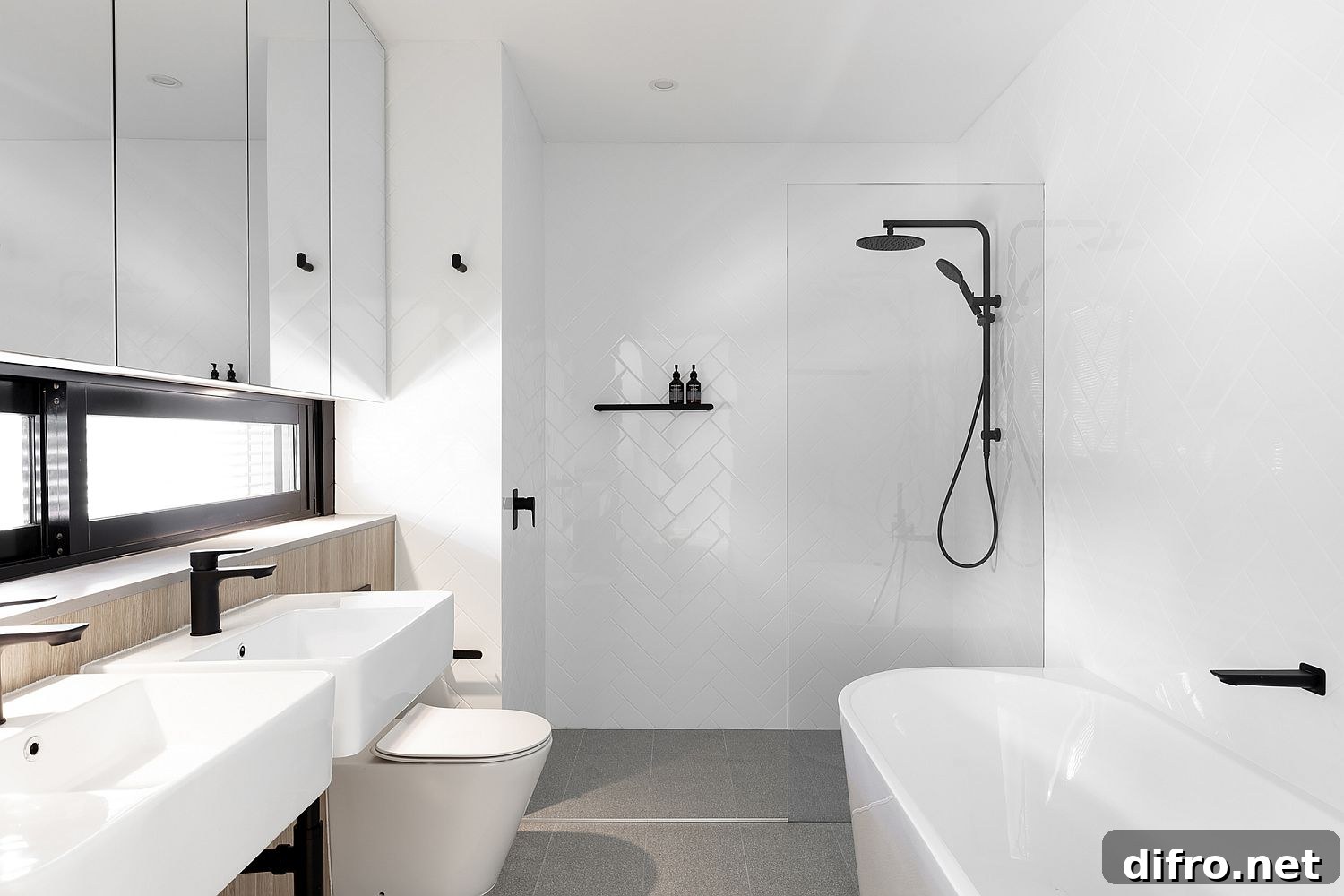 All white bathroom with wood and black accents