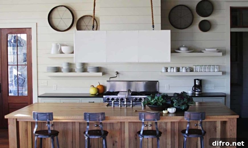Rustic shiplap kitchen with wooden bar and stools