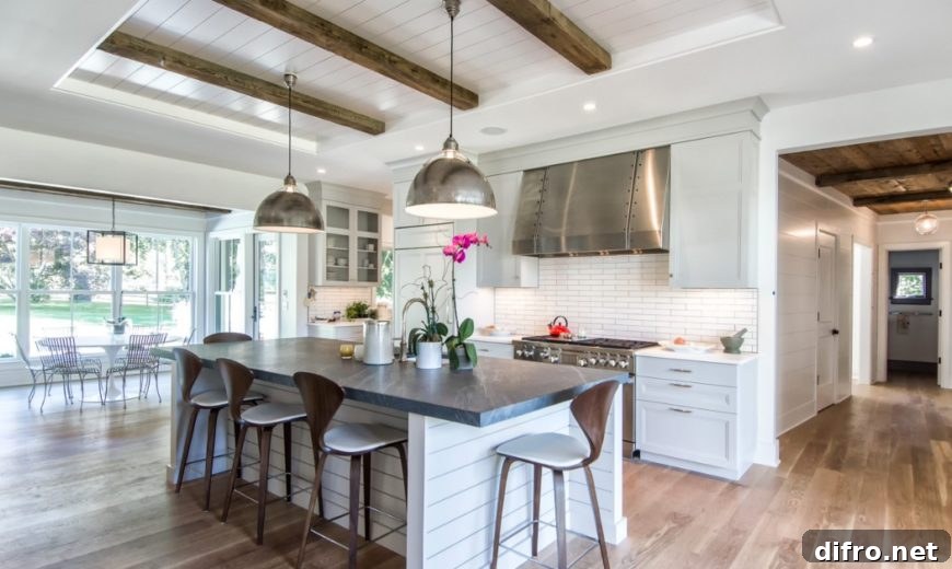 Open-plan kitchen and dining area with shiplap accents