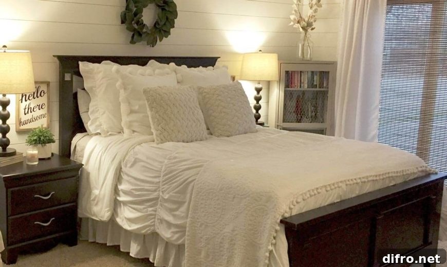 Bedroom with white shiplap and mahogany furniture