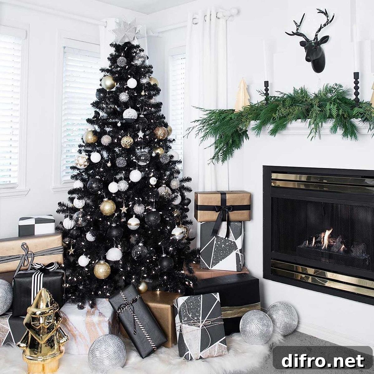Black Christmas tree with silver star topper.