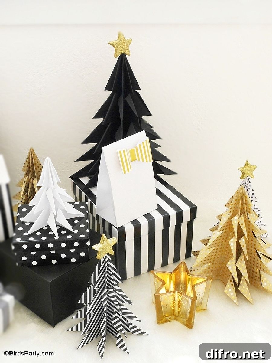 Small black Christmas tree with gold star topper beside a gold Christmas tree and others.