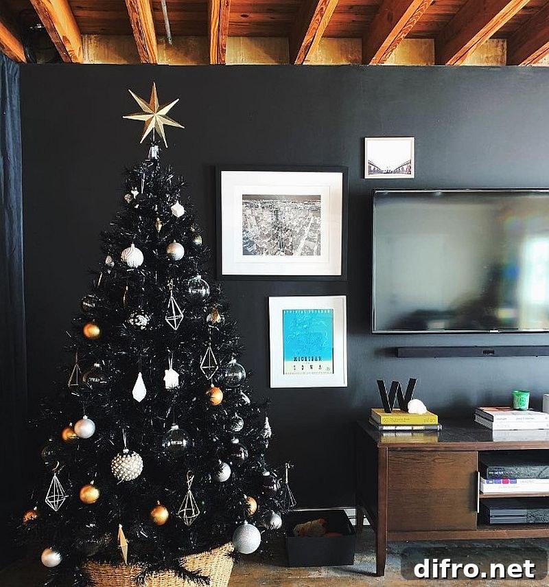 Black Christmas tree with golden star topper.