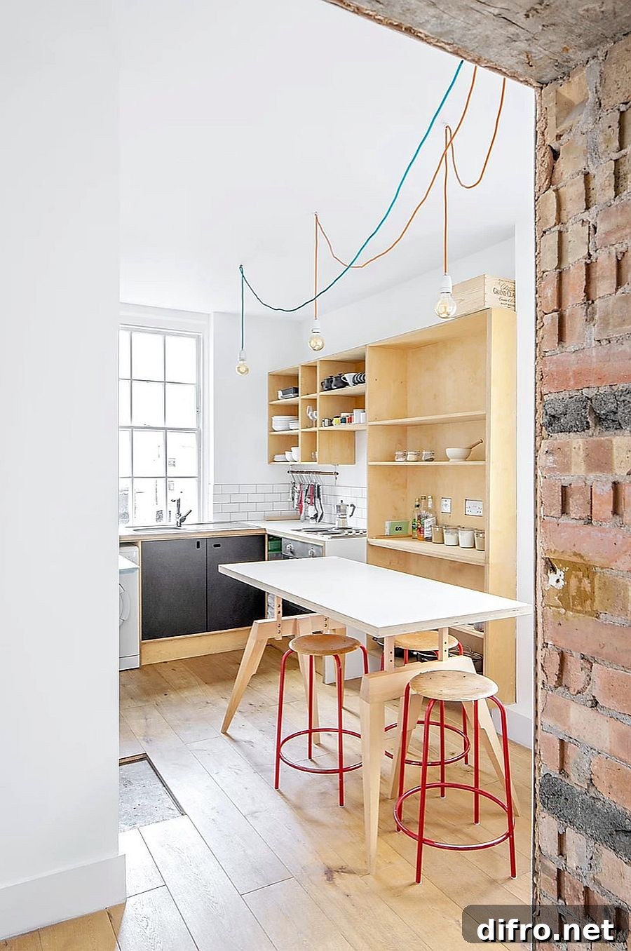 Red and wood bar stools in kitchen