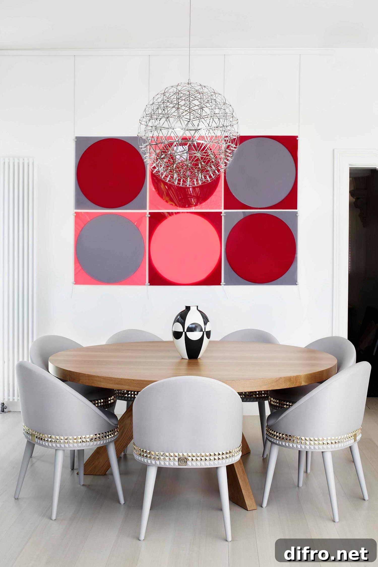 Contemporary dining room where wall art supplies color and character