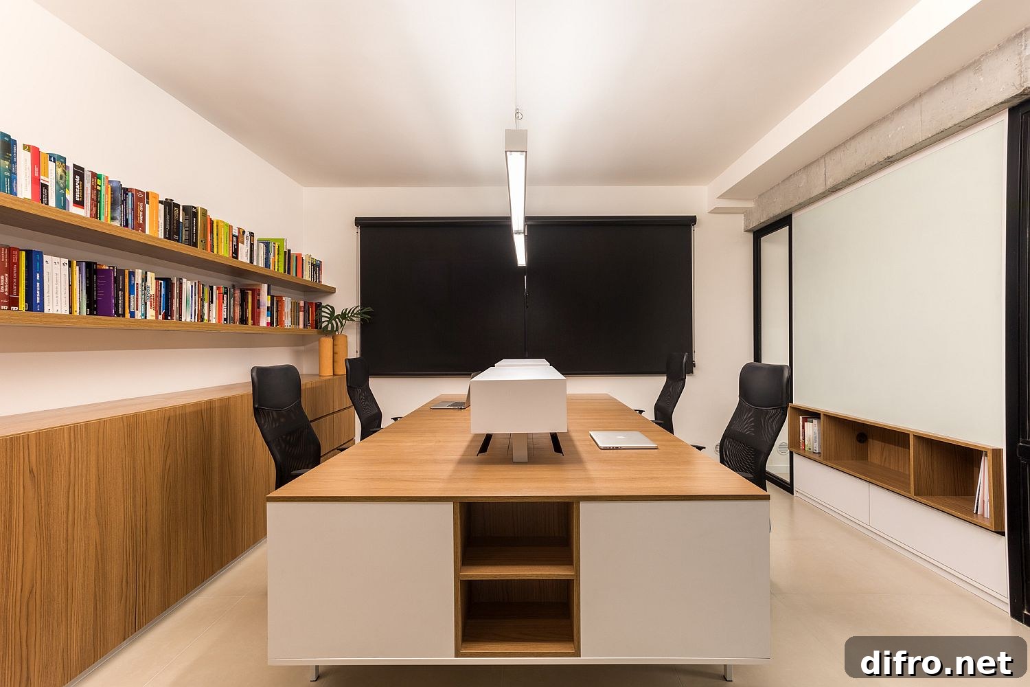 Neutral hues shape the meeting room with wood and white taking over