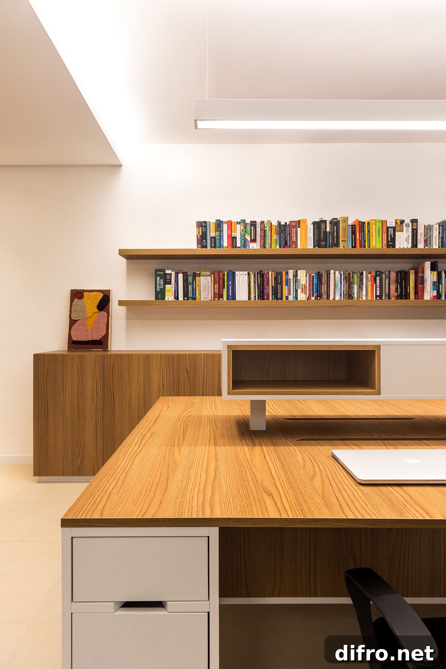 Series of floating wooden shelves hold books and other accessories