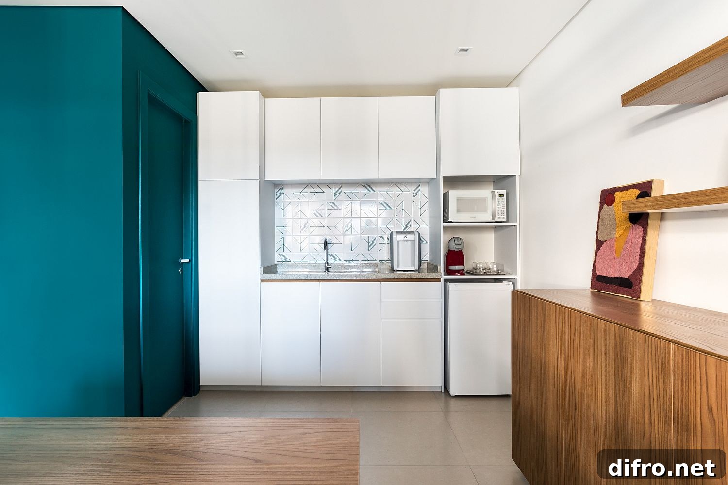 Functional kitchen and spacious workspaces inside the office