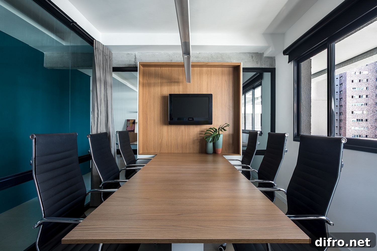 Meeting room inside the office with green accent wall