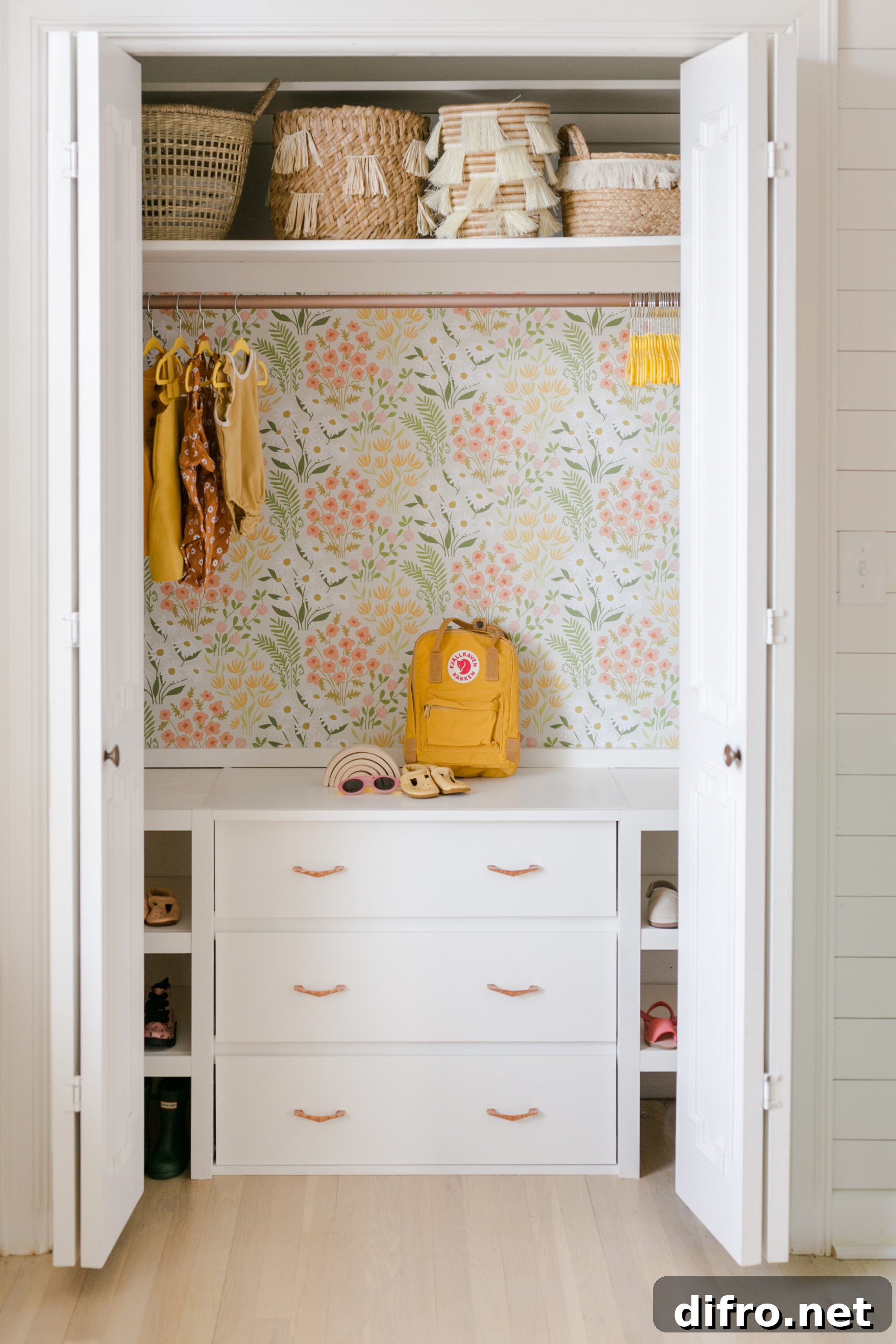 Custom kids closet with drawers and shelves