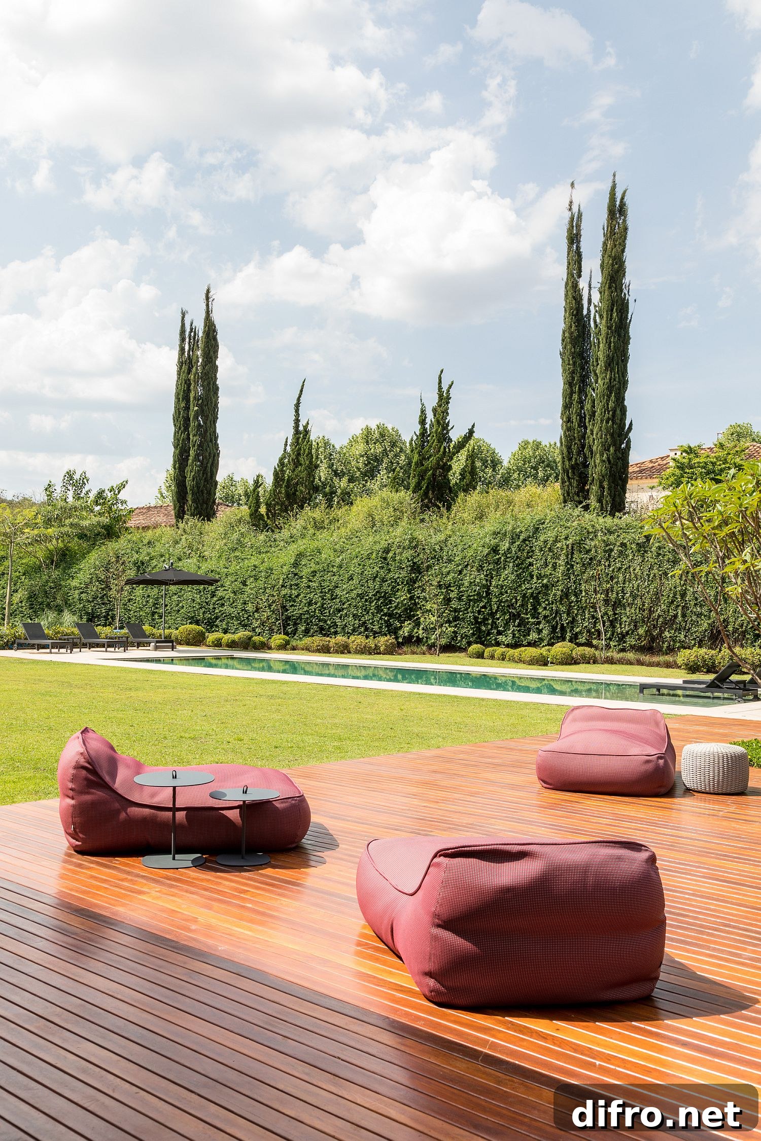 Wooden deck next to the pool