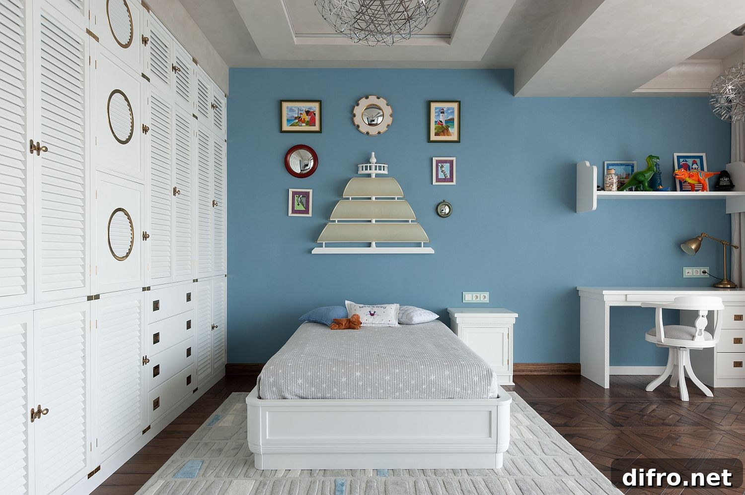 Gray and white kids' bedroom with blue accent wall