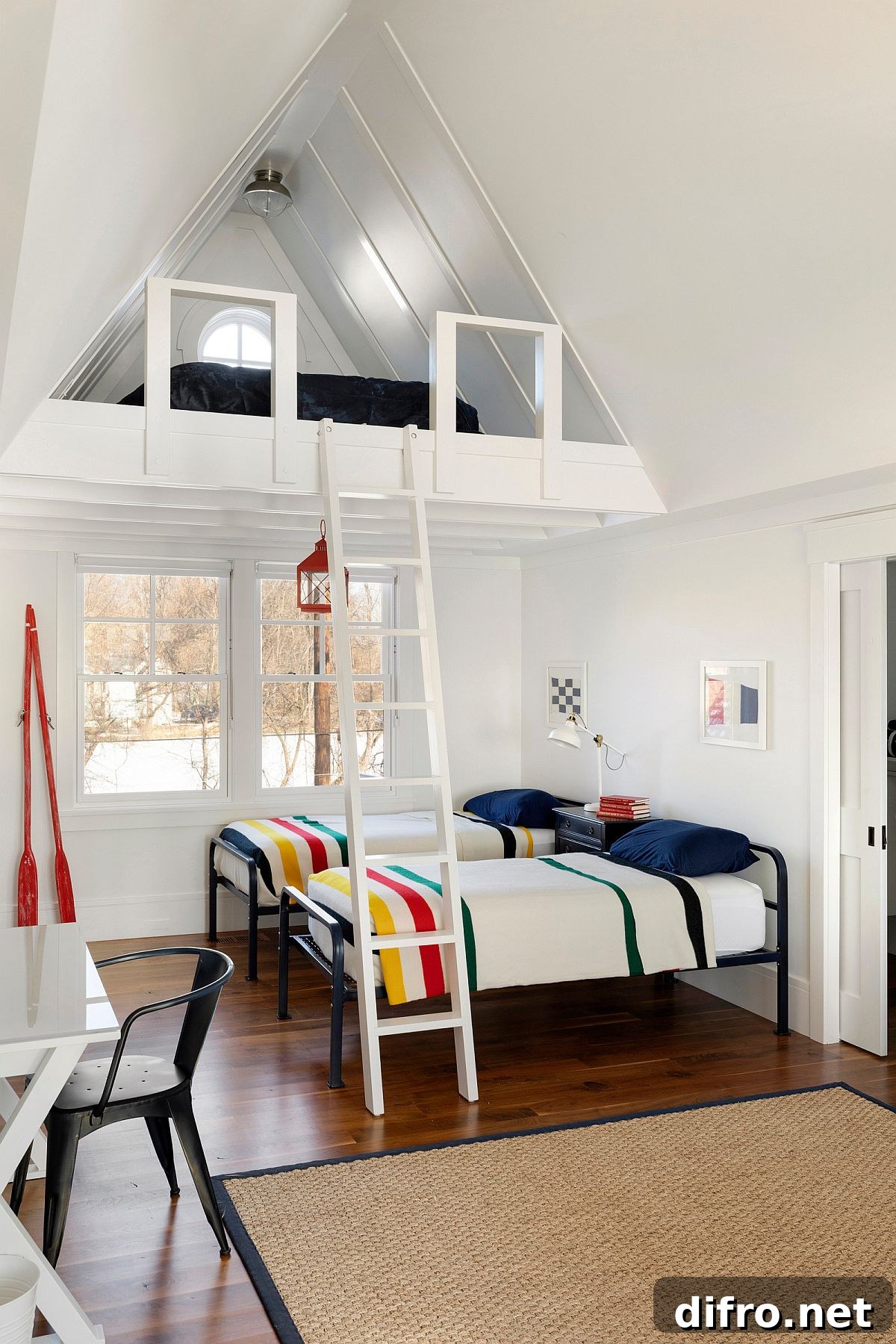 Vertical space used in an all-white beach-style bedroom