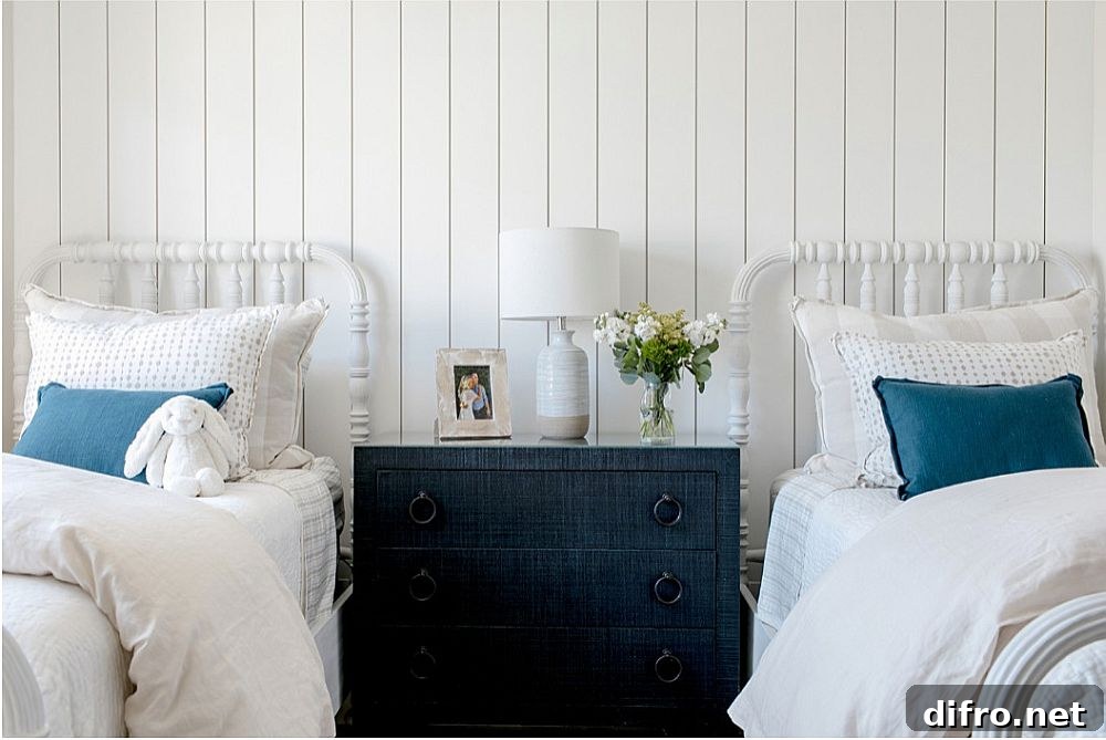 Dark blue accents in a beach-style bedroom