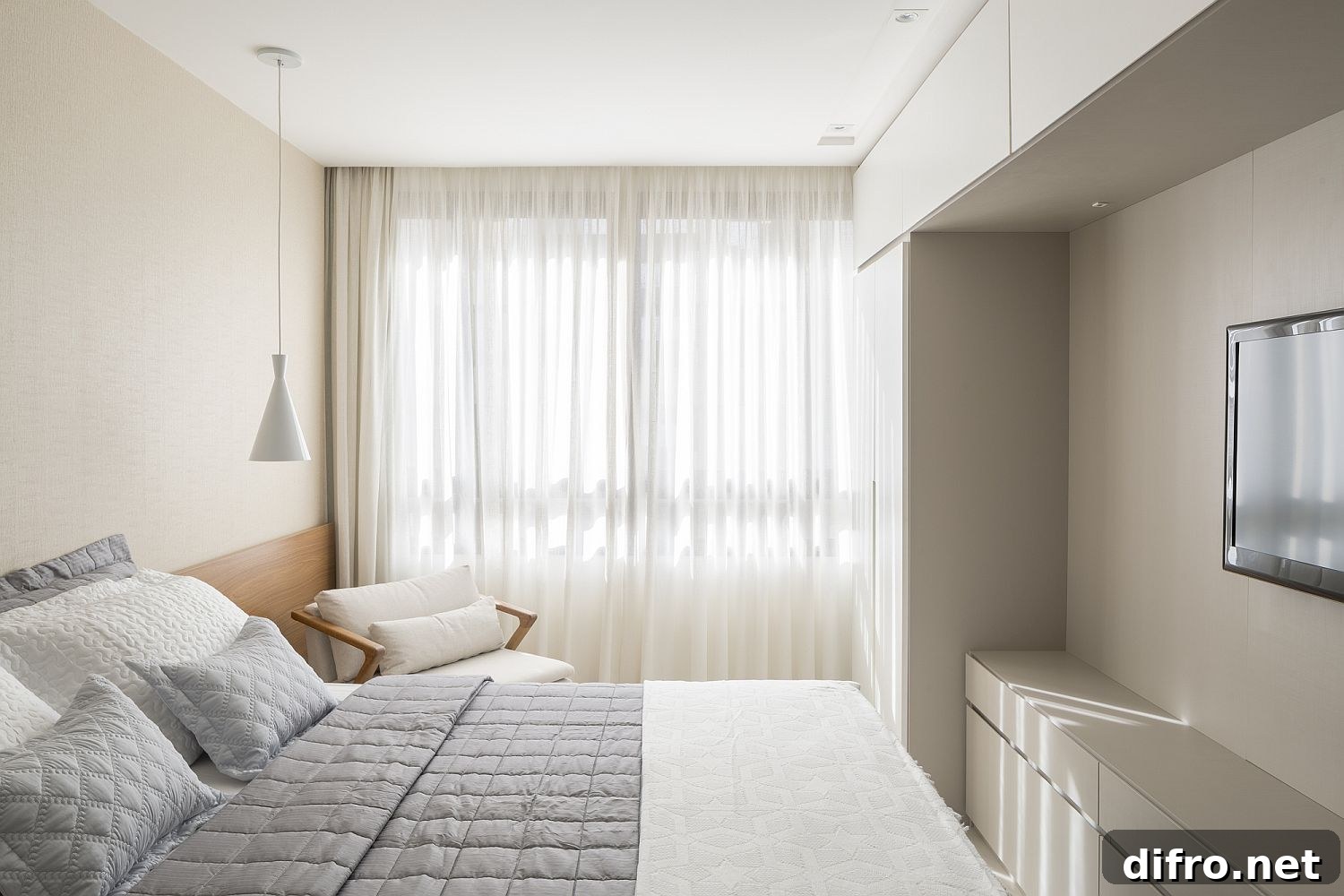 Small all-white bedroom with adaptive lighting