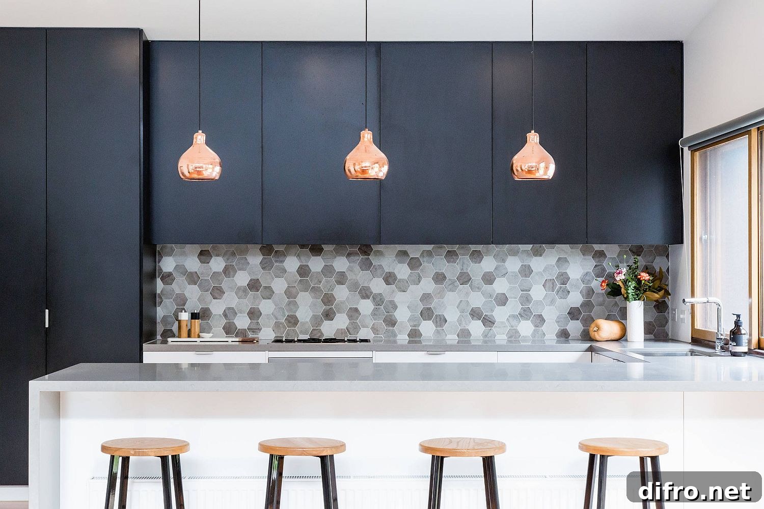 Gray hexagonal tile backsplash in a modern kitchen