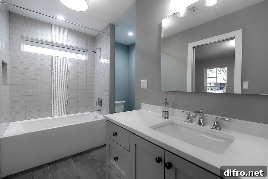 Gray painted bathroom with modern finishes.