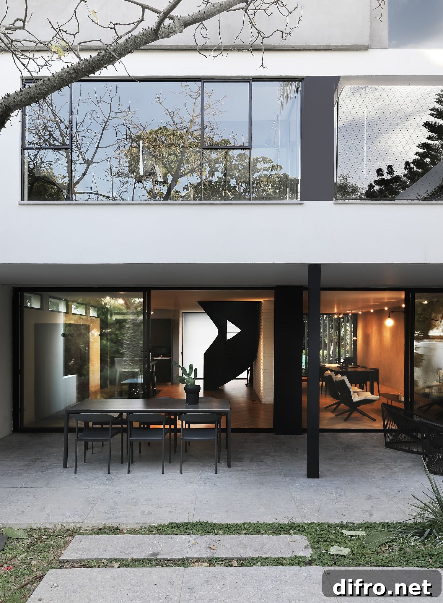 Covered dining area and patio offering natural shade