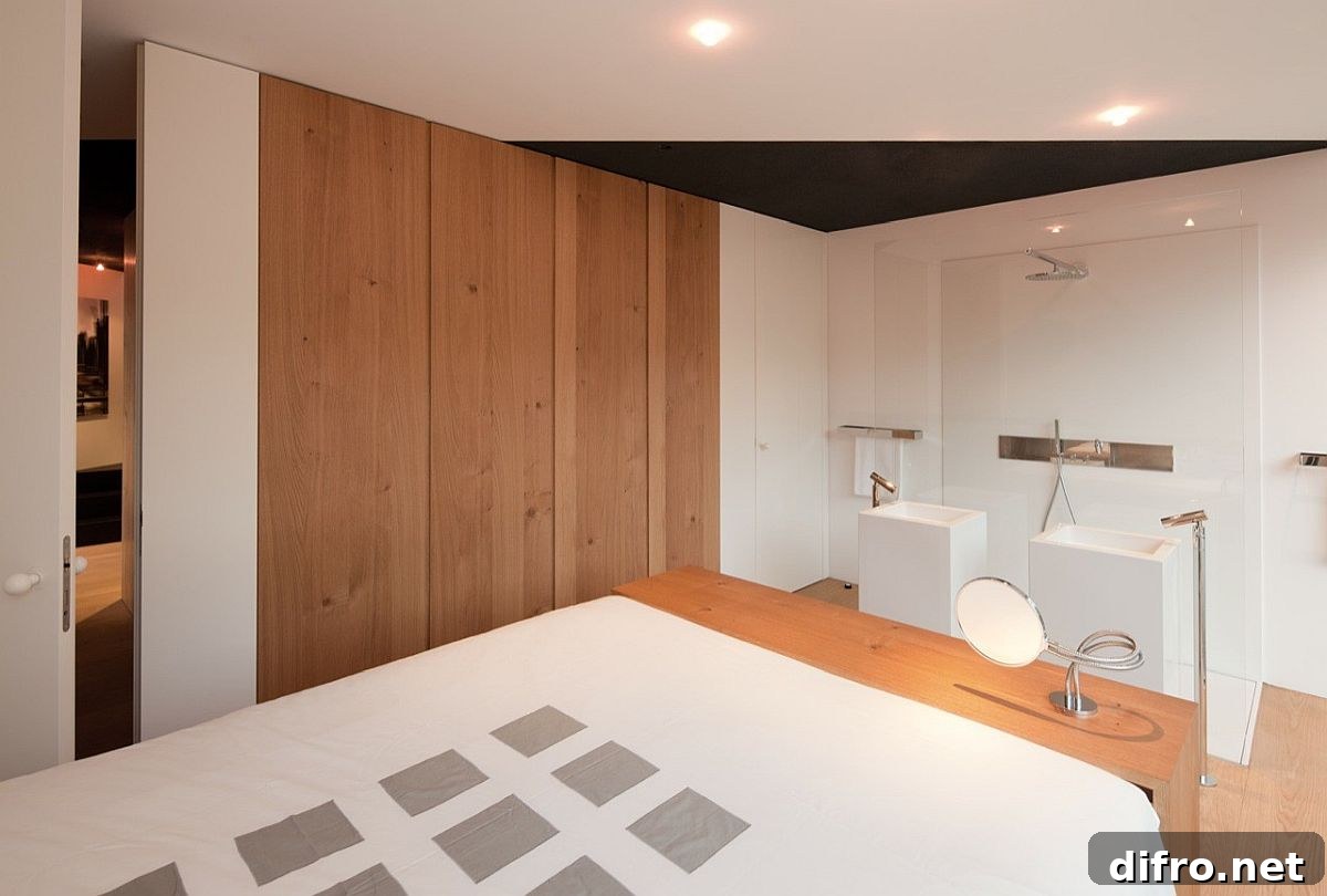 Modern minimal master bedroom and bathroom in wood and white
