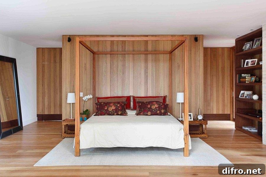 Classic four-poster bed for the modern bedroom with accent wood wall